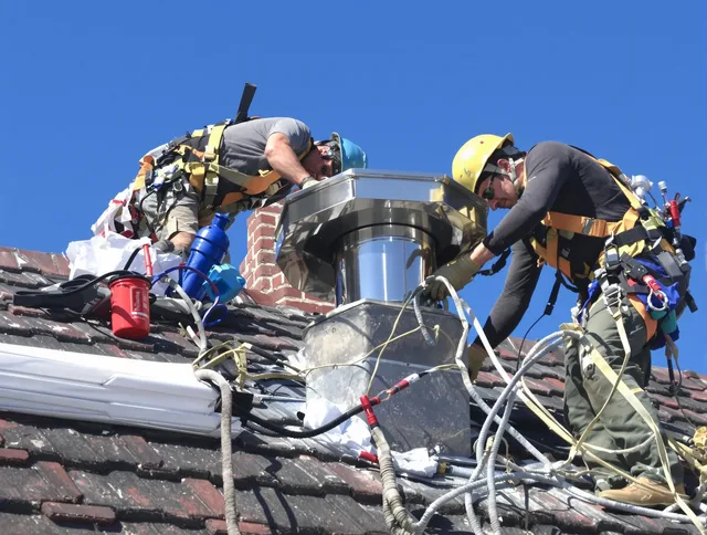 Protective chimney cap installed by Ellington Chimney Sweep in Ellington, CT